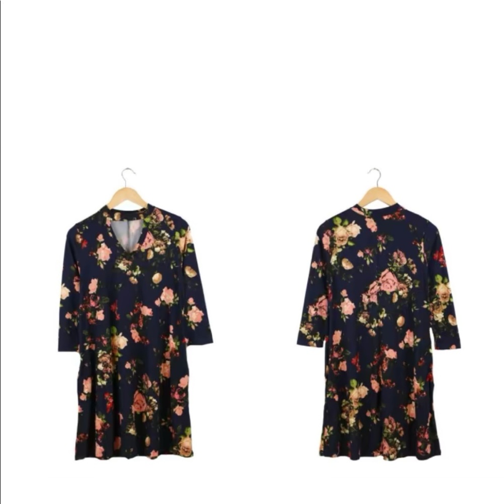 Black floral tunic with keyhole.